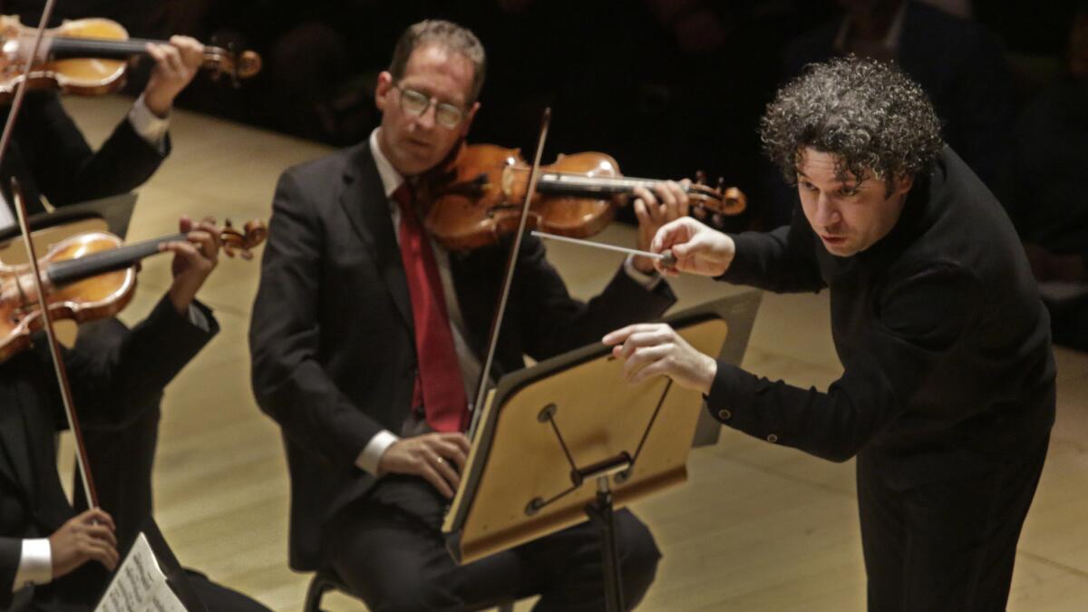 Gustavo Dudamel conducting the LA Phil, the Simón Bolívar Symphony and Los Angeles Master Chorale in Beethoven's 9th Symphony at Walt Disney Concert Hall in on Oct. 4, 2015.