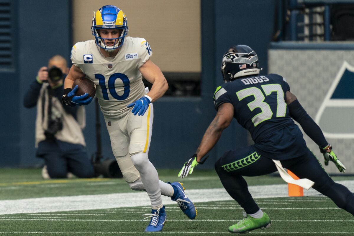 Rams wide receiver Cooper Kupp runs with the ball against the Seattle Seahawks on Dec. 27, 2020.