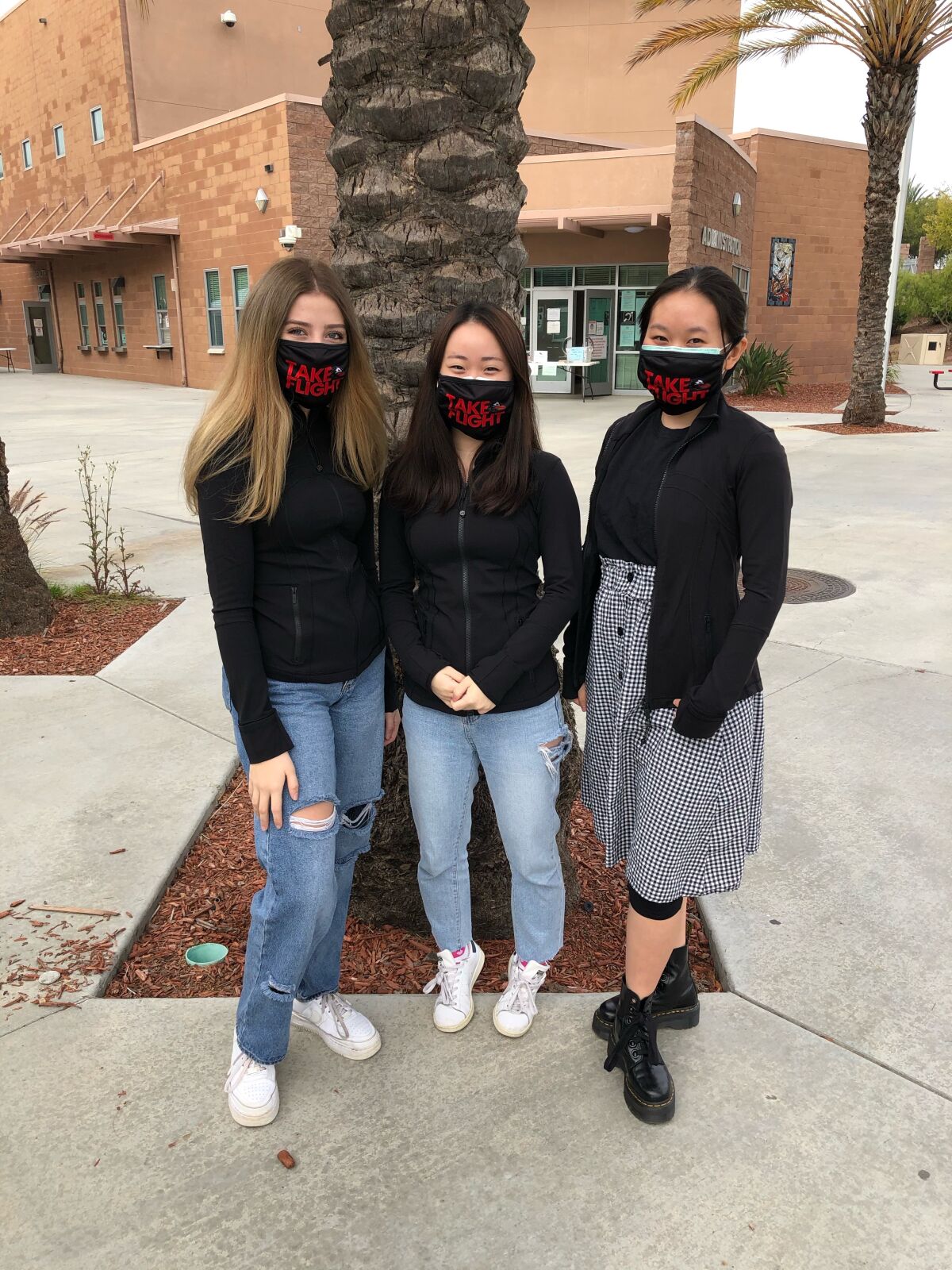 Canyon Crest Academy yearbook editors Jessica Carpenter, left, Yeonwoo Chu and Amanda Zhang.