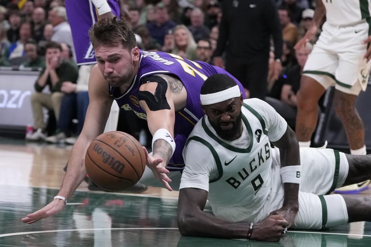 Lakers takeaways: What we discovered from the workforce's five-game highway journey 5 The Bucks' Bobby Portis and the Lakers' Luka Doncic battle for a loose ball on Saturday in Milwaukee.