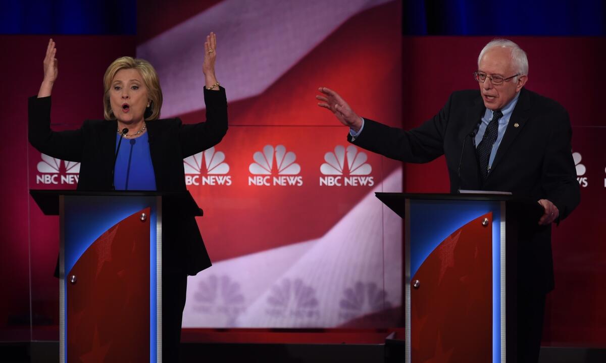 Democratic presidential candidates Hillary Clinton, left, and Bernie Sanders participate in the NBC News -YouTube debate on Jan. 17, 2016 at the Gaillard Center in Charleston, S.C.