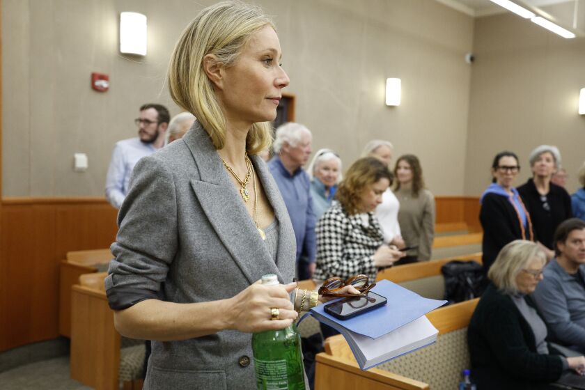 Gwyneth Paltrow enters the courtroom after a lunch break in her trial, Thursday, March 23, 2023, in Park City, Utah, where she is accused in a lawsuit of crashing into a skier during a 2016 family ski vacation, leaving him with brain damage and four broken ribs. Terry Sanderson claims that the actor-turned-lifestyle influencer was cruising down the slopes so recklessly that they violently collided, leaving him on the ground as she and her entourage continued their descent down Deer Valley Resort, a skiers-only mountain known for its groomed runs, après-ski champagne yurts and posh clientele. (AP Photo/Jeff Swinger, Pool)