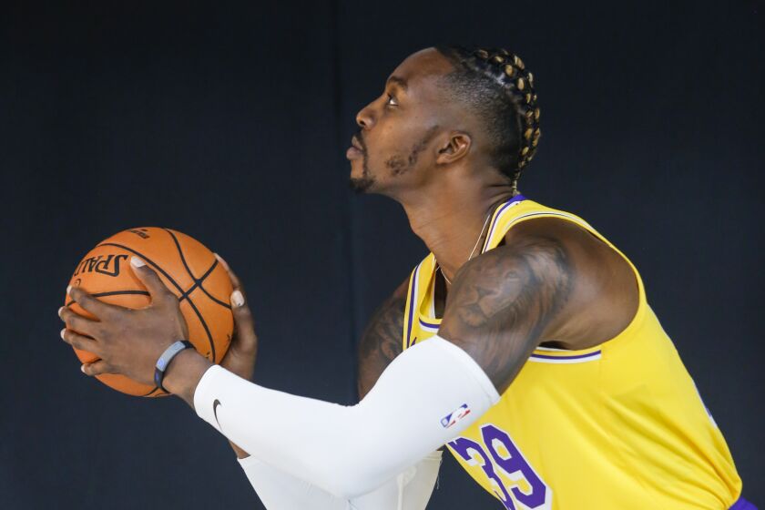 Los Angeles Lakers center Dwight Howard attends the NBA basketball team's media day in El Segundo, Calif., Friday, Sept. 27, 2019. (AP Photo/Ringo H.W. Chiu)