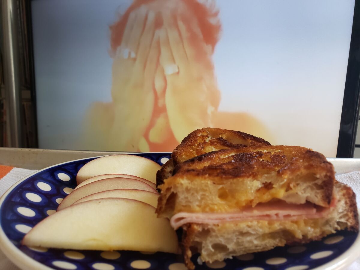 A grilled ham and cheese sandwich and a scene from the 1988 disaster flick "Miracle Mile."