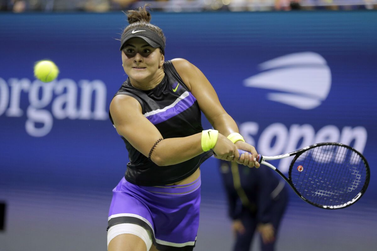 Bianca Andreescu hits a return during her victory over Taylor Townsend in the fourth round of the U.S. Open on Monday.