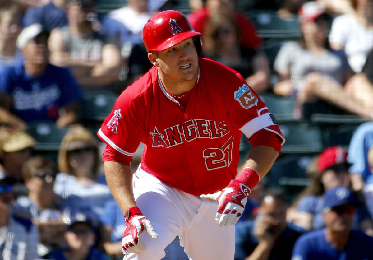 Angels outfielder Mike Trout hustles out of the box against the Dodgers during a spring training game on March 9.