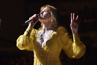 FILE - Florence Welch of Florence + The Machine performs during "The High As Hope Tour" in Chicago on Oct 19, 2018. Welch is supplying the lyrics and co-writing music for a stage musical of “The Great Gatsby,” it was announced Wednesday. She will collaborate on the music with Thomas Bartlett. The story writer is Martyna Majok, who was awarded the 2018 Pulitzer Prize for Drama for “Cost of Living.” (Photo by Rob Grabowski/Invision/AP, File)