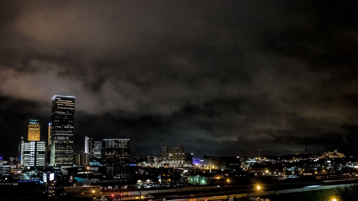 Downtown Tulsa, looking over the Arts District, on a rainy night. The district was renamed from the Brady Arts District because of concerns about the man that the name honored.