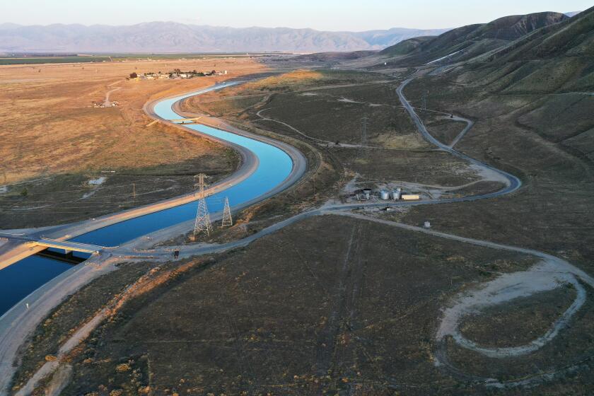 BAKERSFIELD, CALIFORNIA - APRIL 21: An aerial view of the California Aqueduct, which moves water from northern California to the state's drier south, on April 21, 2021 near Bakersfield, California. California Gov. Gavin Newsom today declared a drought emergency in two counties following a winter with little precipitation. The order will allow the state to more quickly prepare for anticipated water shortages. Earth Day is April 22. (Photo by Mario Tama/Getty Images)