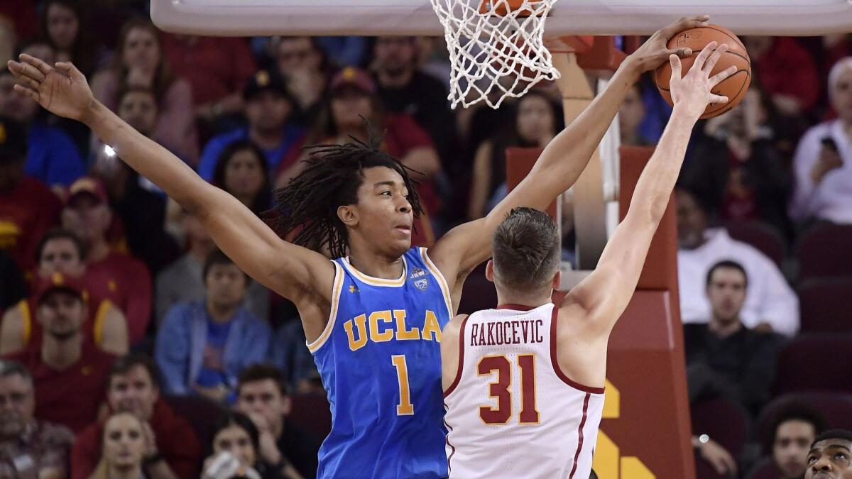 USC forward Nick Rakocevic is blocked by UCLA center Moses Brown during a Jan. 19 game.