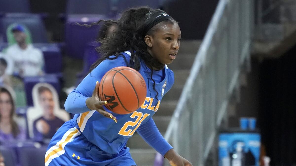 UCLA forward Michaela Onyenwere in action against Washington during.