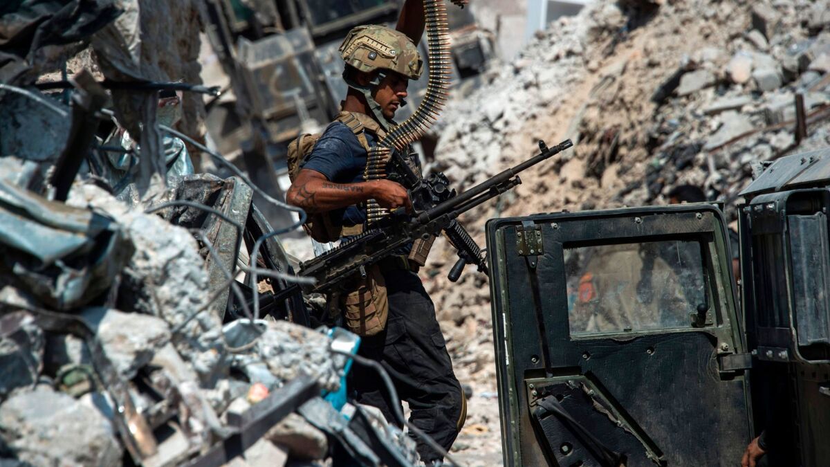 A member of the Iraqi forces in the Old City of Mosul on Monday.