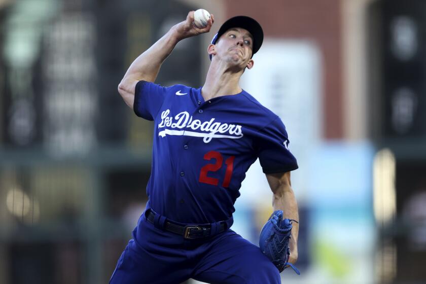 The Dodgers' Walker Buehler pitches against the San Francisco Giants during the first inning June 10, 2022.