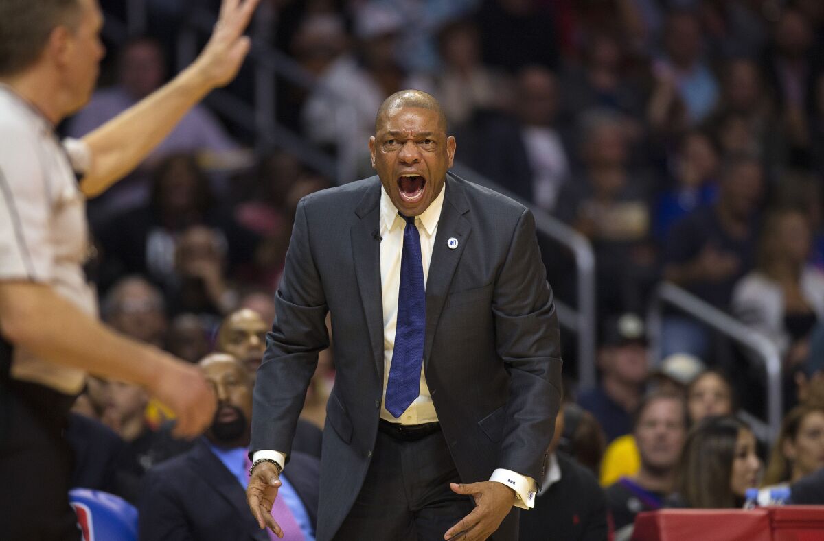 Clippers Coach Doc Rivers reacts after J.J. Redick is called for a technical foul during the first half of a game against the Warriors at Staples Center on Feb. 20.