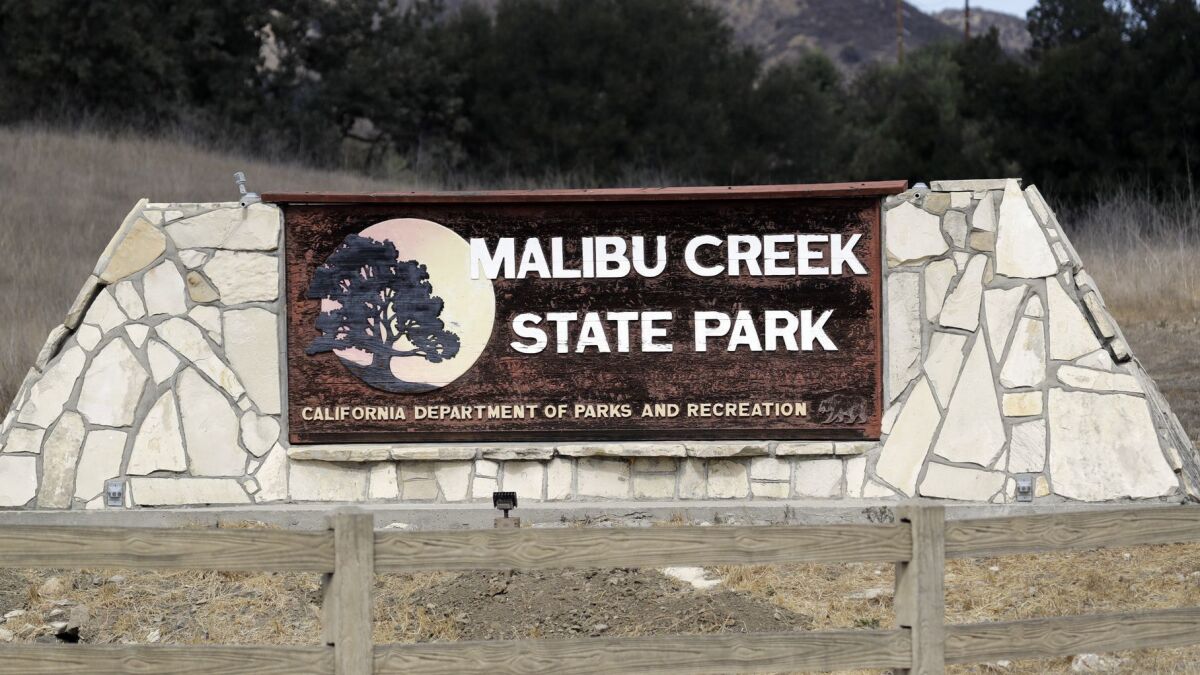 Investigators used ballistic testing to determine if a rifle carried by a burglary suspect is connected to a series of shootings in the Malibu Creek State Park area.
