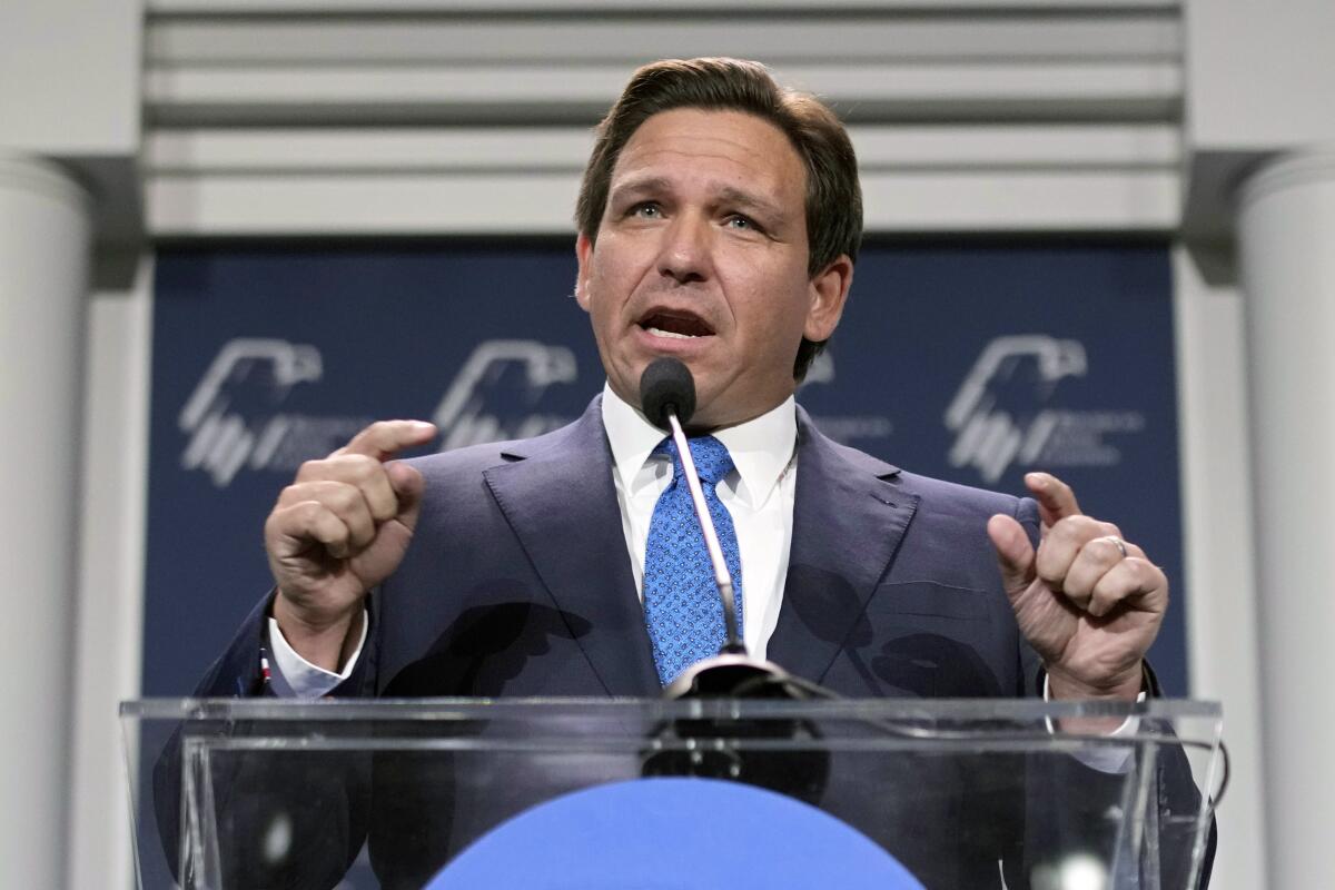 Florida Gov. Ron DeSantis at a lectern.