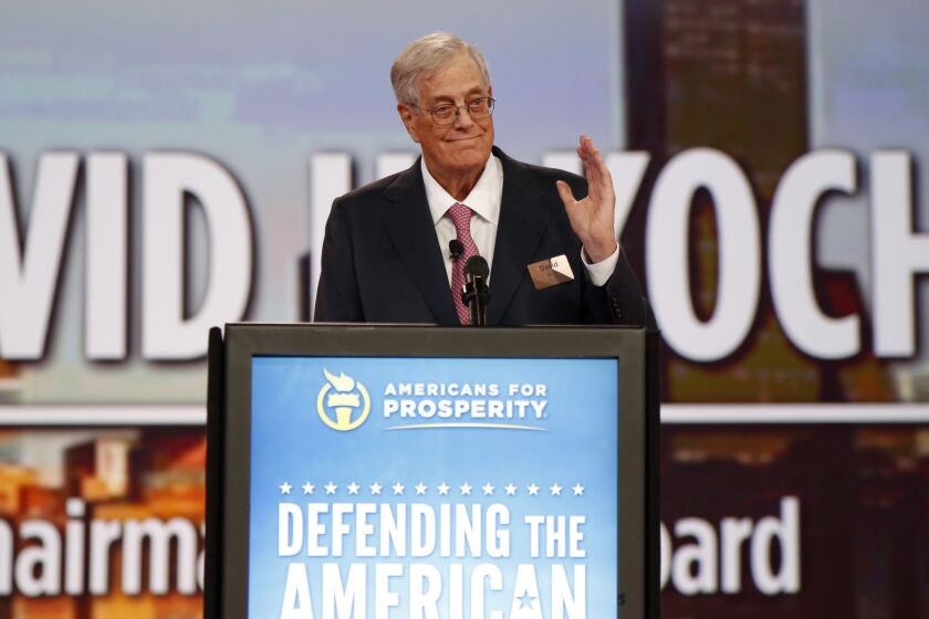 FILE - In this Aug. 1, 2015 file photo, Chairman of the board of Americans for Prosperity David Koch speaks at the Defending the American Dream summit hosted by Americans for Prosperity at the Greater Columbus Convention Center in Columbus, Ohio. Koch, a major donor to conservative causes and educational groups, has died on Friday, Aug. 23, 2019. He was 79. (AP Photo/Paul Vernon, File)