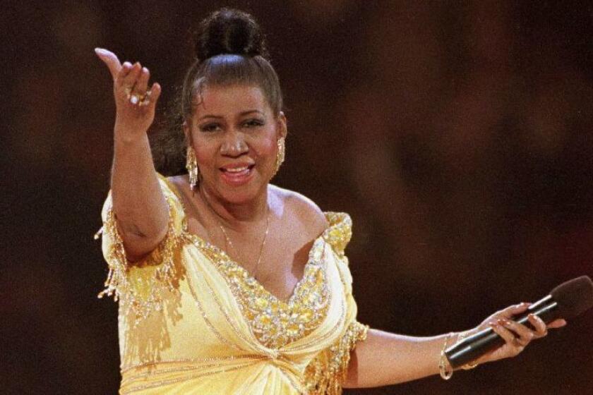 FILE - In this Jan. 19, 1993 file photo, singer Aretha Franklin performs at the inaugural gala for President Bill Clinton in Washington. Franklin died Thursday, Aug. 16, 2018, at her home in Detroit. She was 76. Throughout Franklin's career, "The Queen of Soul" often returned to Washington - the nation's capital - for performances that at times put her in line with key moments of U.S. History. (AP Photo/Amy Sancetta, File)
