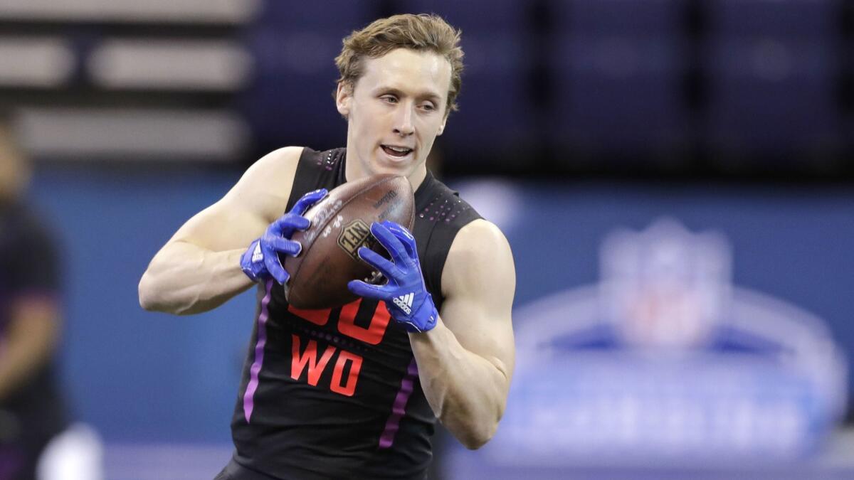 SMU wide receiver Trey Quinn runs a drill during the NFL football scouting combine on March 3 in Indianapolis.