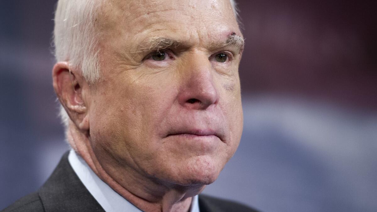 Sen. John McCain (R-Ariz.) speaks to reporters on Capitol Hill in Washington in July 2017.