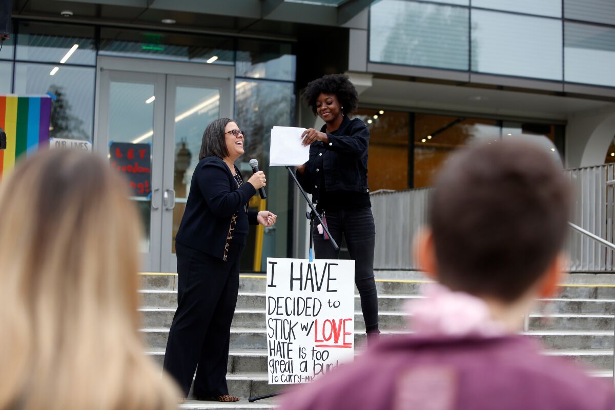 Whittier College President Linda Oubré, left, and the college's Black Student Assn. president, Journee Bradford, address students during a campus commemoration for Martin Luther King Jr. on Jan. 20. Bradford is leading the charge to stop holding classes on MLK Day.