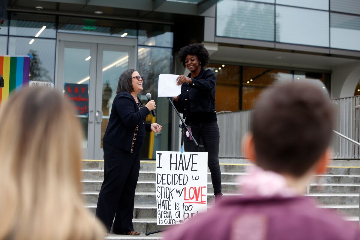 Whittier College President Linda Oubré, left, speaks at a commemoration for Martin Luther King Jr.