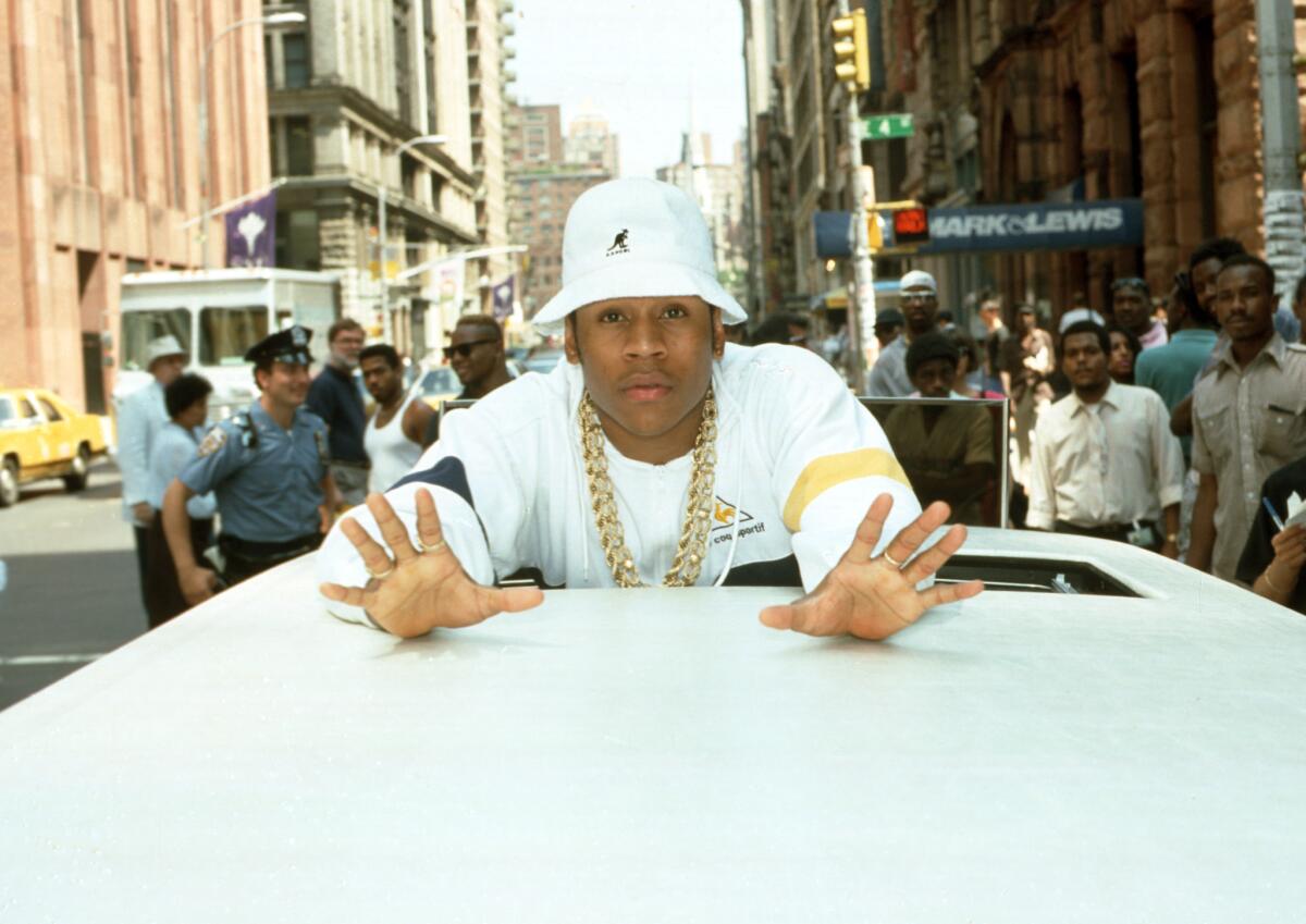 In hip-hop's early days, LL Cool J, seen here in New York circa 1988, was known for his Kangol hat and thick gold chain.