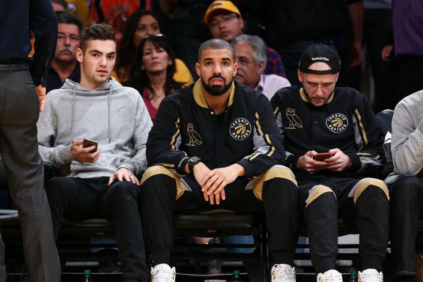 Rapper Drake attends an NBA basketball game between the Los Angeles Lakers and Toronto Raptors at Staples Center on Friday, Nov. 20, 2015, in Los Angeles. (Photo by John Salangsang/Invision/AP)