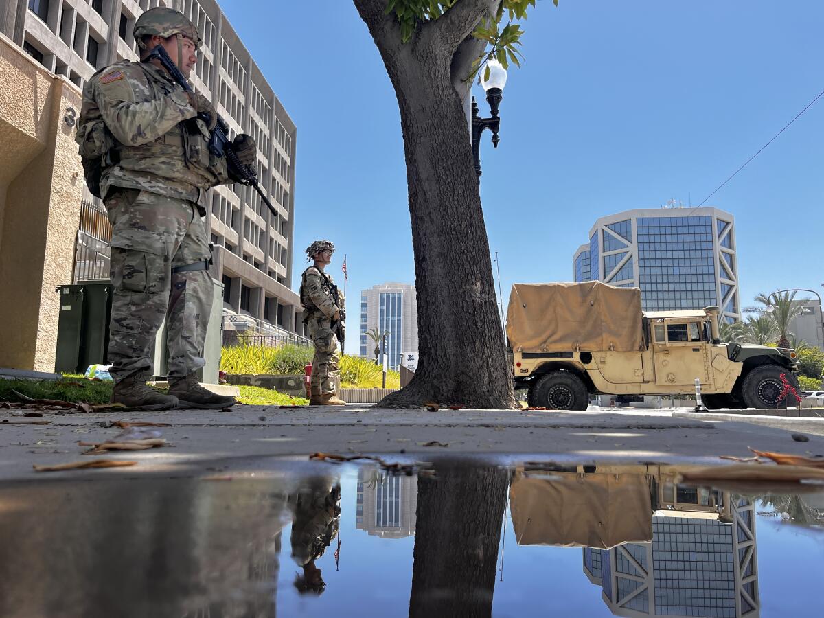 California National Guard members stationed outside of the Santa Ana Federal Building after anti-ICE protests in the city.
