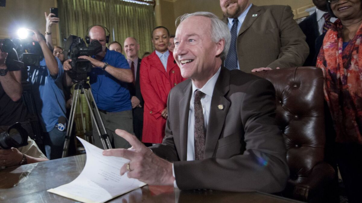 Arkansas Gov. Asa Hutchinson at a 2015 bill signing.