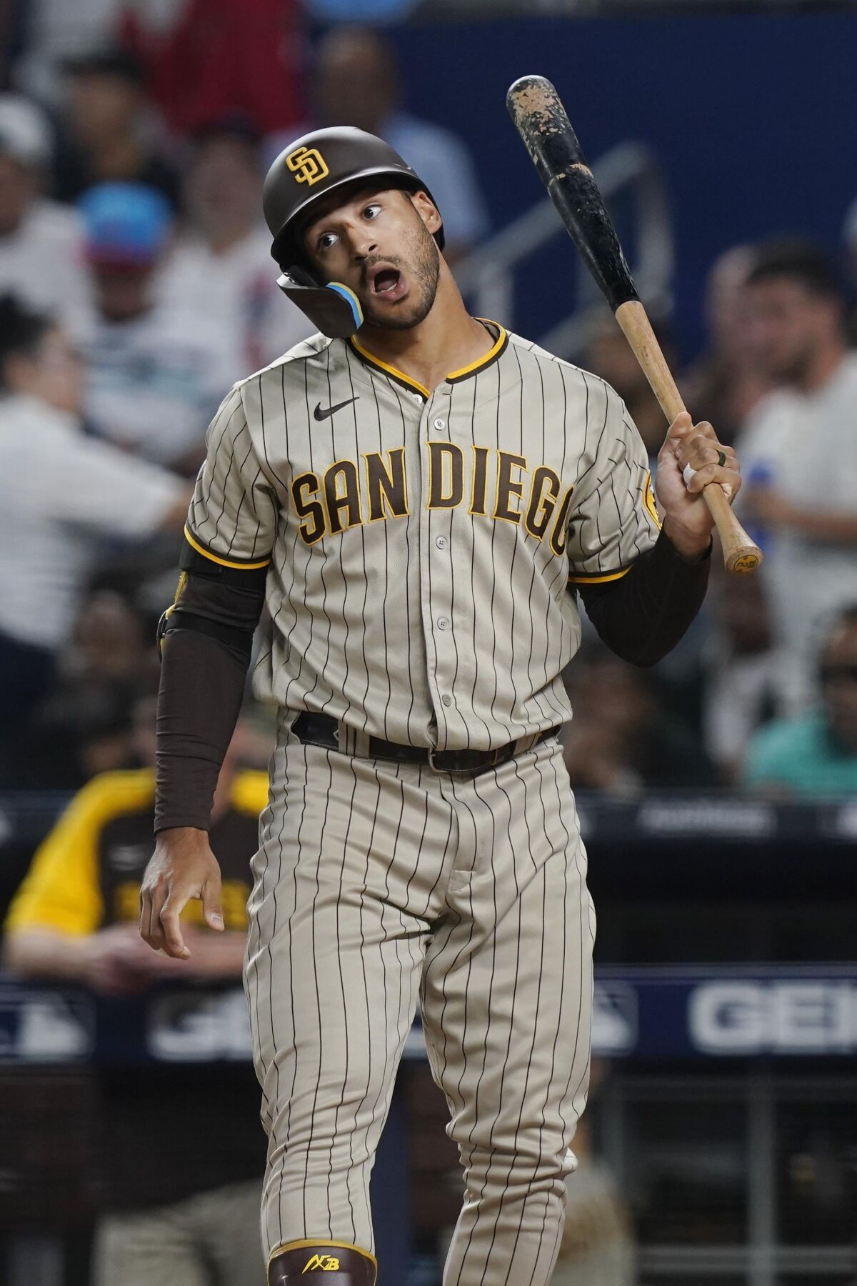 Trent Grisham gestures after a strike is called during his second-inning at-bat against the Marlins' Sandy Alcantara.