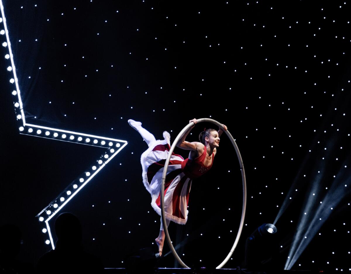 Wheel acrobat Rachel Salzman in A Magical Cirque Christmas, playing Dec. 27 at the San Diego Civic Theatre.
