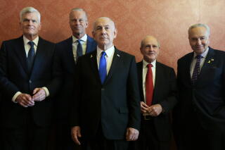 Benjamin Netanyahu poses with U.S. lawmakers.
