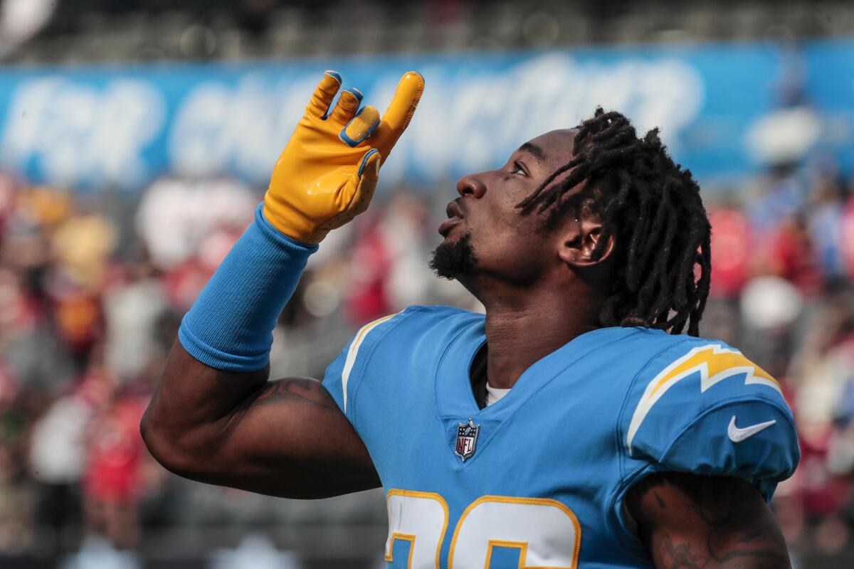  Chargers cornerback Asante Samuel Jr. gestures pregame.