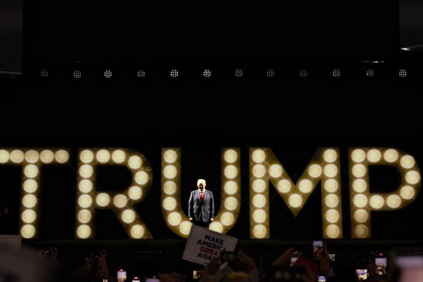 Milwaukee, WI - July 18: Former President Trump walks onstage for his nomination acceptance speech Thursday night at the Republican National Convention on Thursday, July 18, 2024 in Milwaukee, WI. (Jason Armond / Los Angeles Times)