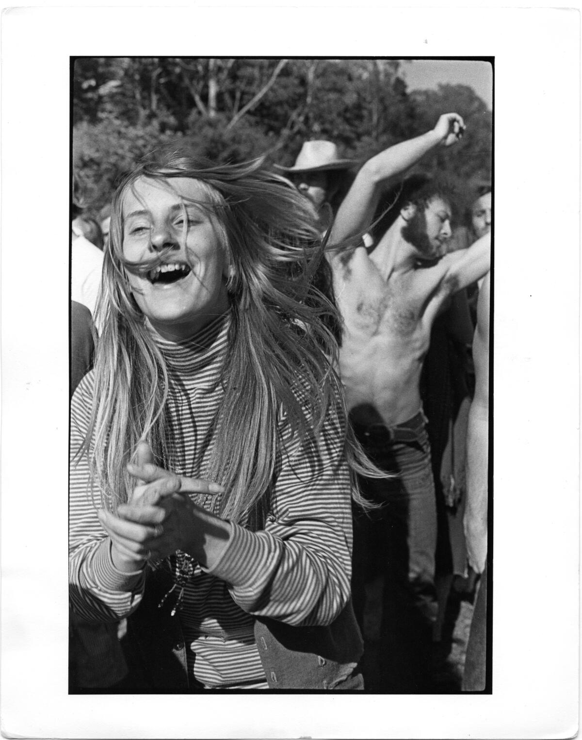 Hippies frolic in San Francisco's Golden Gate Park.
