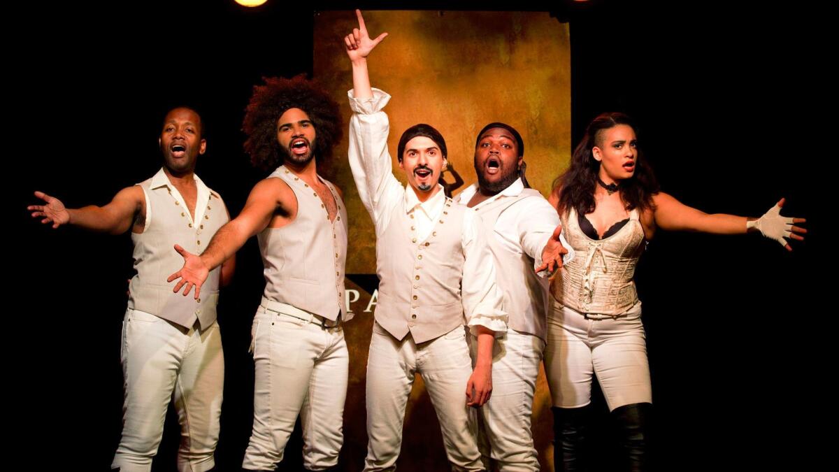 From left: Chris Anthony Giles, Nicholas Edwards, Dan Rosales, Juwan Crawley and Nora Schell in the Off-Broadway production of "Spamilton"?? at the Triad. (Carol Rosegg)