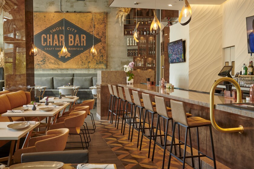 The bar and a portion of the dining room of Smoke City Char Bar.