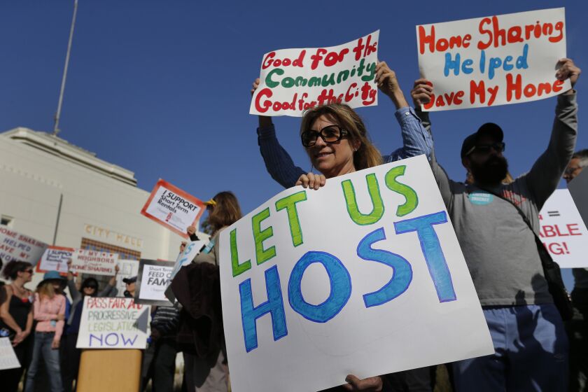 Airbnb supporters rally outside the Santa Monica City Hall on Tuesday.