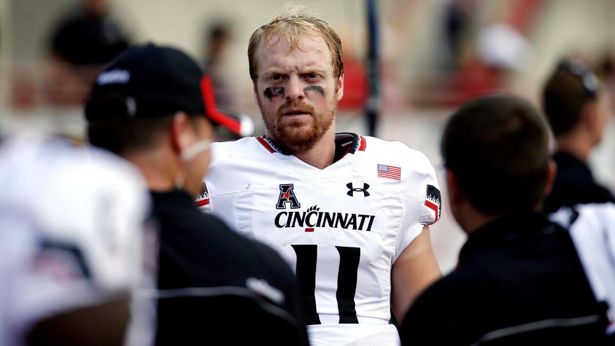 Cincinnati quarterback Gunner Kiel, shown last week before a victory over Miami of Ohio, was knocked out of the game Thursday night during a loss to Memphis.