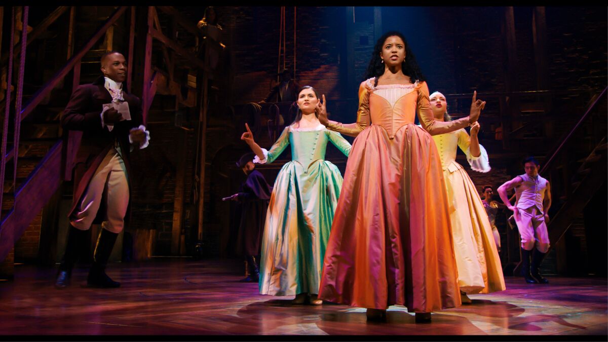 Renée Elise Goldsberry, center, performs the standout song "Satisfied" in "Hamilton."