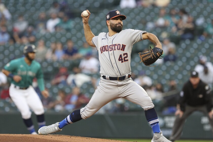 Houston Astros starting pitcher Jose Urquidy throws to a Seattle Mariners batter during the second inning of a baseball game Friday, April 16, 2021, in Seattle (AP Photo/Jason Redmond)