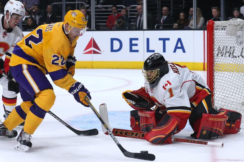 Trevor Lewis (22) and the Kings will take on goalie Jonas Hiller, a familiar foe from his days with the Ducks, and the Flames in a must-win situation Wednesday night in Calgary.