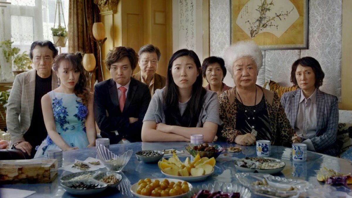 Awkwafina, center, in the movie "The Farewell."