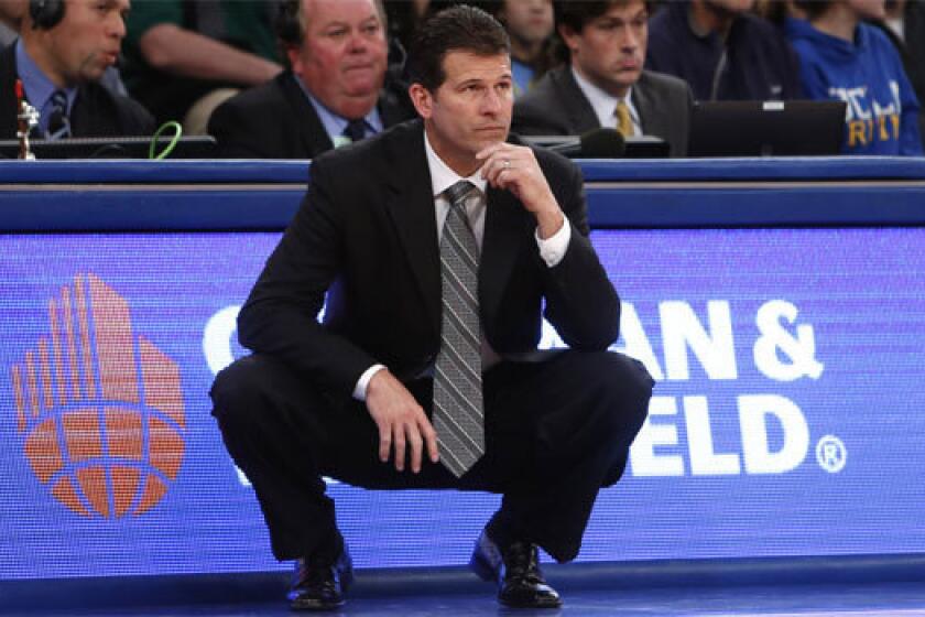 UCLA Coach Steve Alford watches from the sideline during the second half of the Bruins' game against Duke on Dec. 19.