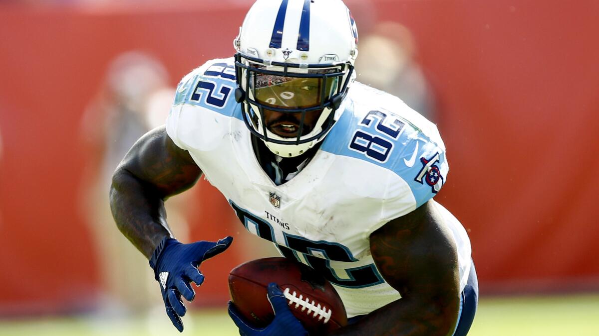 Titans tight end Delanie Walker picks up yards after a catch against the Raiders during a game earlier this season.