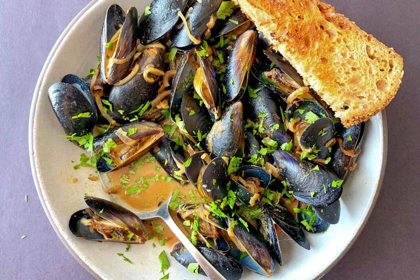 LOS ANGELES, CA., May 28, 2020: la-fo-how-to-boil-water-mussels May 28, 2020 (Ben Mims/ Los Angeles Times)