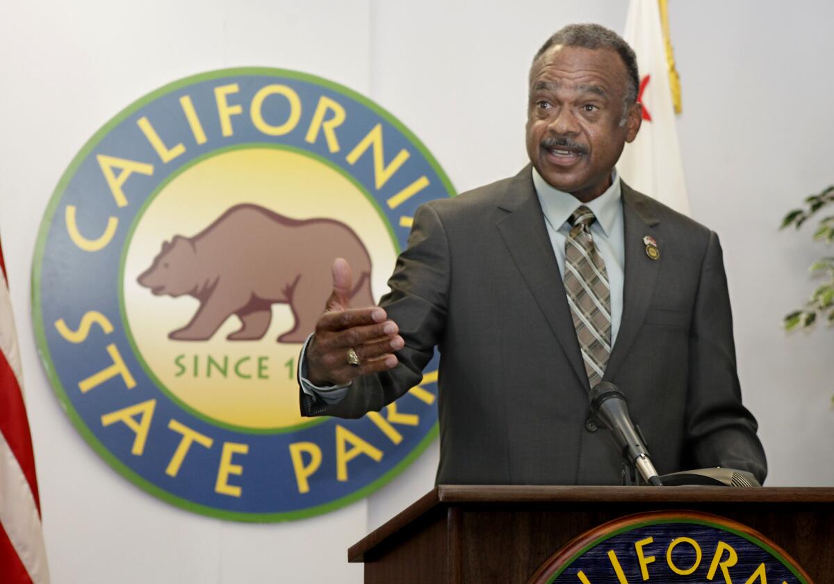 Anthony Jackson talks with reporters after being sworn in as California's parks director in November 2012.
