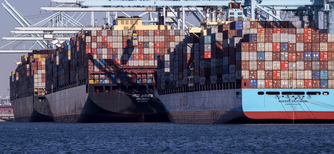 Thousands of containers are unloaded from a ship at the Ports of Los Angeles and Long Beach.