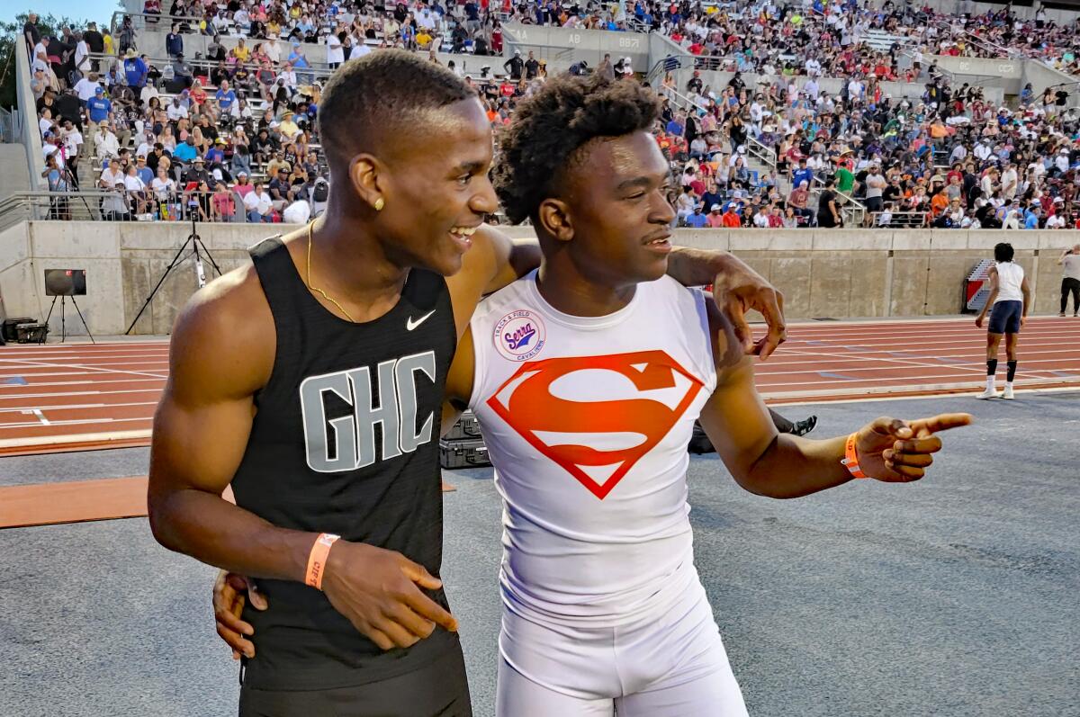 Dijon Stanley (left) of Granada Hills and Rodrick Pleasant of Gardena Serra, competitors since youth days